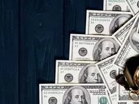 Stack%20of%20money%20dollars%20laid%20out%20like%20a%20ladder%20